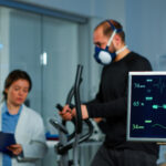 Cardiologist-consults-with-a-patient-remotely-via-teleconference.